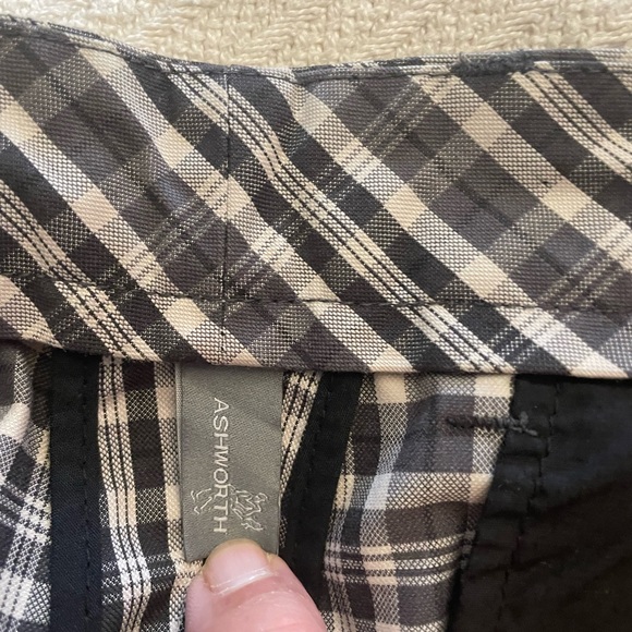 Ashworth Men’s Golf Shorts. Waist size is 35”. Black background with a pattern. - Picture 6 of 6